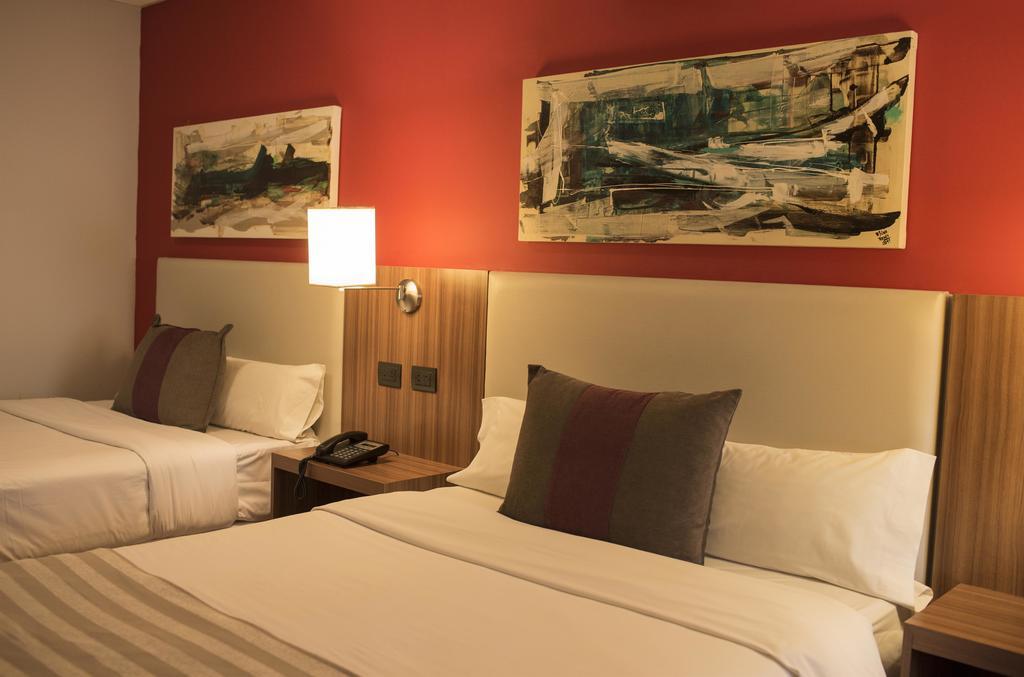 Hotel Bicentenario Suites&Spa San Miguel de Tucumán Kamer foto